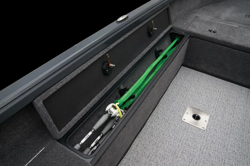 Slide: The Image of Manufacturer Provided Image: Manufacturer Provided Image: 2025 Ranger VS1665SC boat storage compartment with fishing rods and green net. - 34