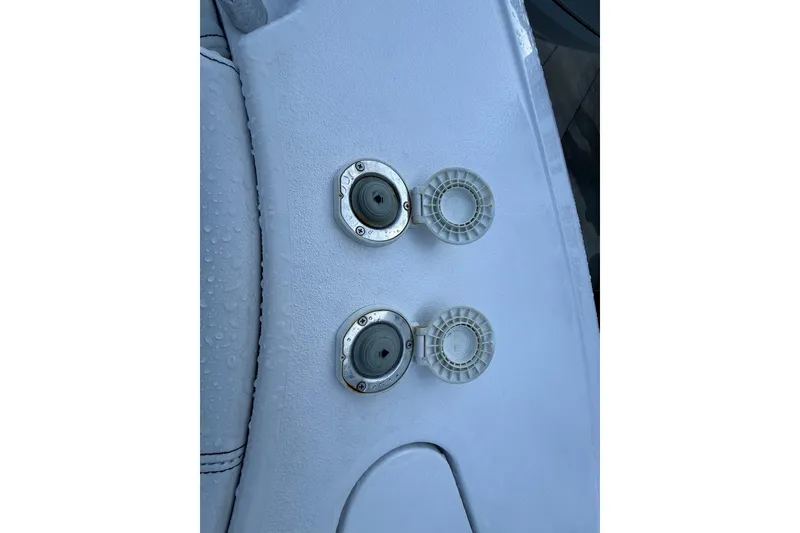 Slide: The Image of Fuel and water caps on 2022 Sportsman Open 232 Center Console boat. - 26