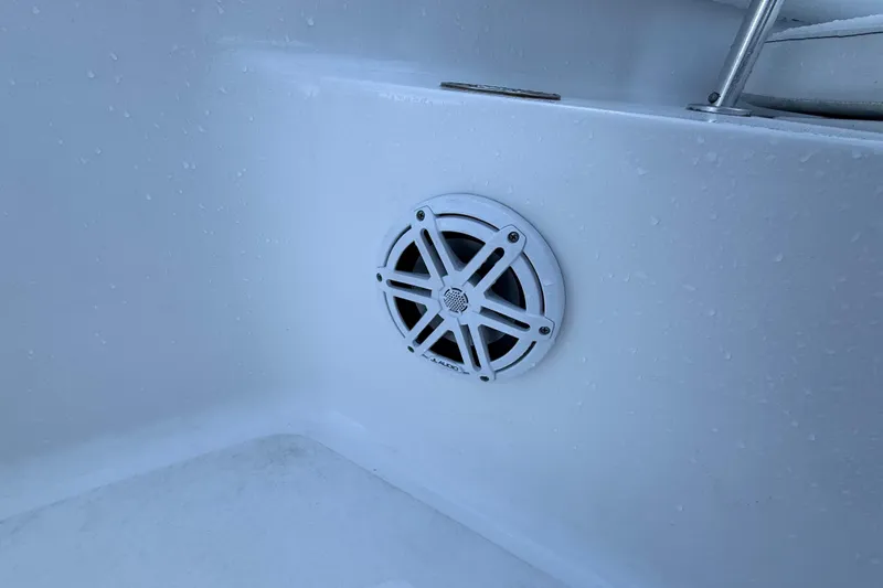 Slide: The Image of Speaker on 2022 Sportsman Open 232 Center Console boat, wet surface. - 33