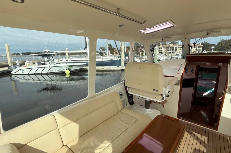 Slide: The Image of Interior view of a 2012 MJM 40z yacht docked at a marina. - 18