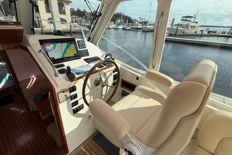 Slide: The Image of Interior helm of 2012 MJM 40z yacht with navigation equipment and leather seating. - 25