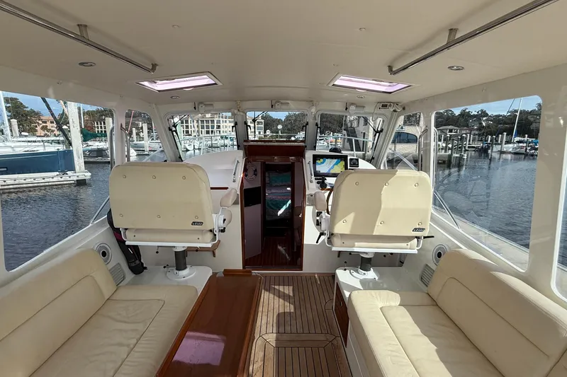 Slide: The Image of Interior view of 2012 MJM 40z yacht with helm and seating area. - 26