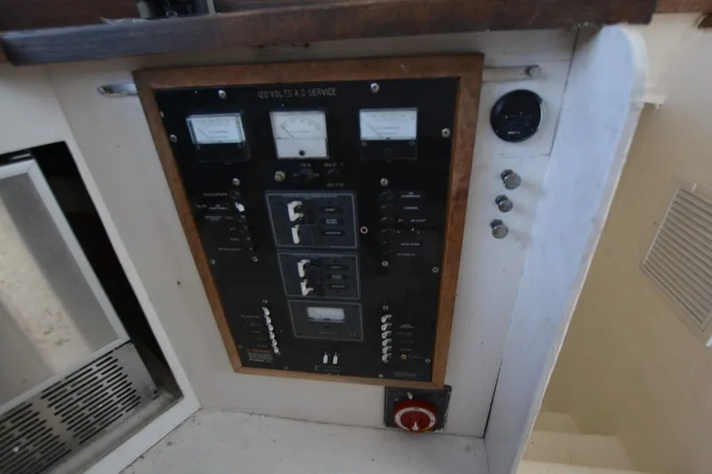 Slide: The Image of Electrical panel on 1983 Key West #1 Sport Fish boat, featuring gauges and switches. - 17