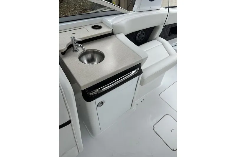Slide: The Image of 2016 Cobalt A28 boat interior with sink and countertop. - 37