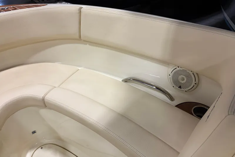 Slide: The Image of 2020 Chris-Craft Launch 28 GT interior seating with speaker and handle detail. - 16