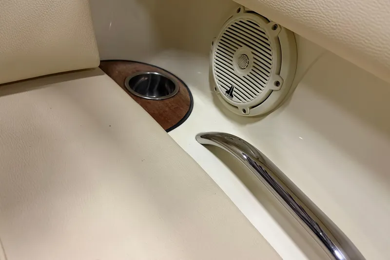 Slide: The Image of 2020 Chris-Craft Launch 28 GT interior with speaker, cup holder, and chrome handle. - 20