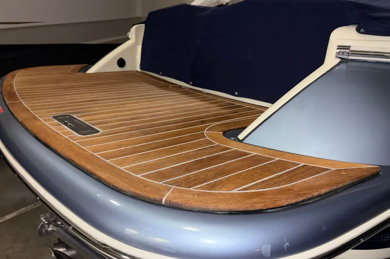 Slide: The Image of 2020 Chris-Craft Launch 28 GT with elegant wooden deck detail. - 3
