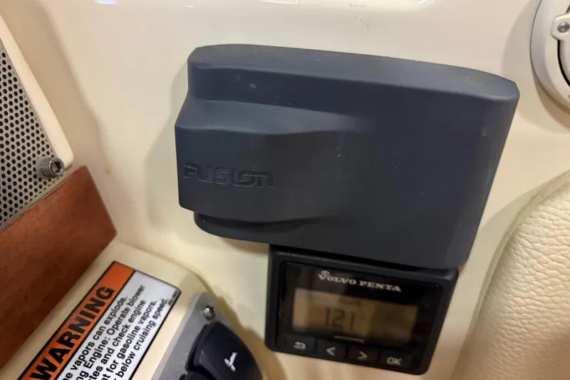 Slide: The Image of 2020 Chris-Craft Launch 28 GT dashboard with Fusion audio and Volvo Penta display. - 8