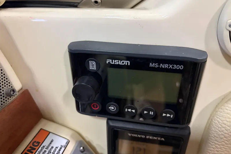 Slide: The Image of Fusion MS-NRX300 stereo system on 2020 Chris-Craft Launch 28 GT boat dashboard. - 9