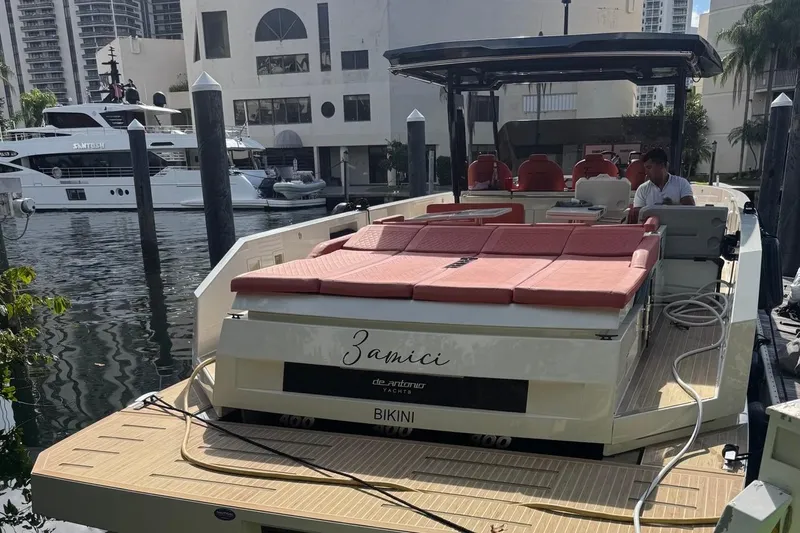 The Image of 2023 De Antonio Yachts D42 Open docked, featuring spacious deck and modern design. - 0