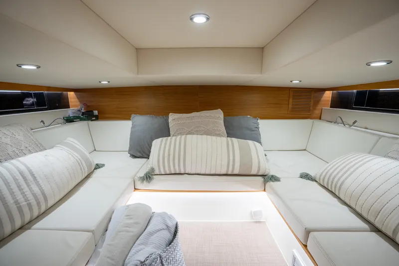 Slide: The Image of Luxurious interior of 2023 De Antonio Yachts D42 Open, featuring cozy seating and elegant lighting. - 20
