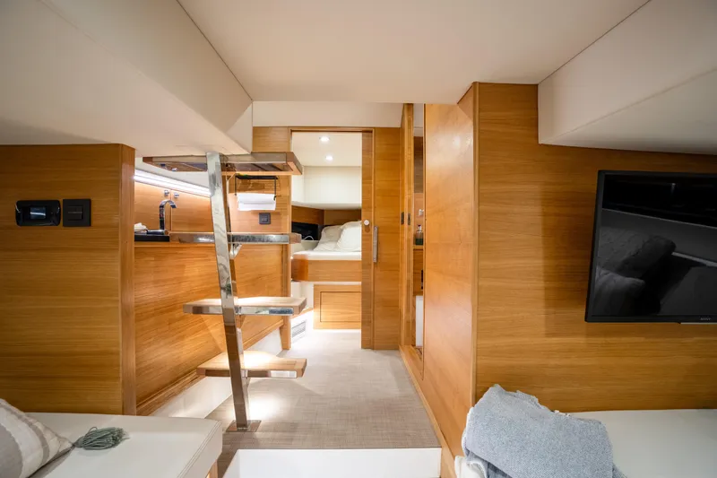 Slide: The Image of Luxurious interior of 2023 De Antonio Yachts D42 Open, featuring modern wood finishes and sleek design. - 22