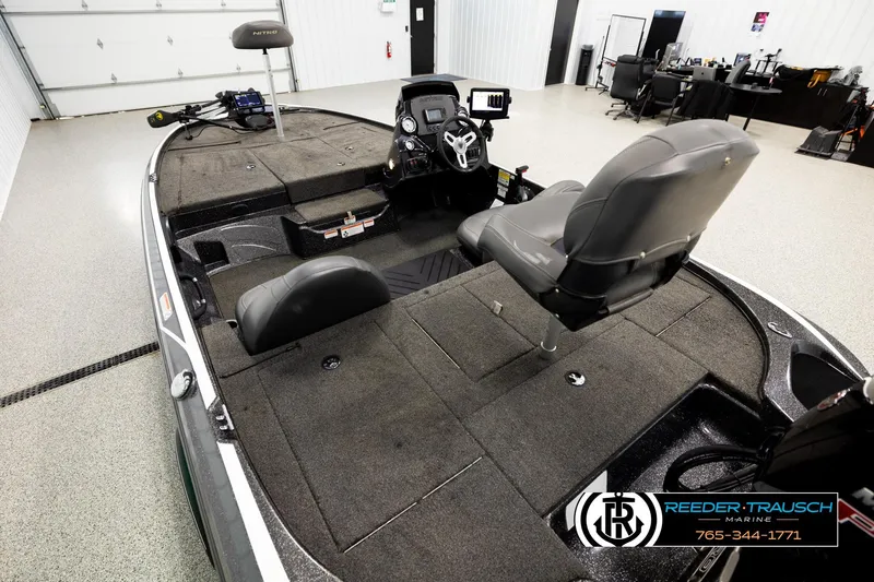 Slide: The Image of Interior view of a 2021 Ntiro Z17 boat in a showroom setting. - 10
