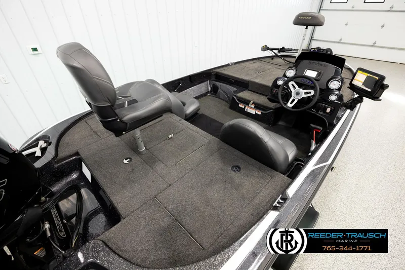 Slide: The Image of Interior of a 2021 Ntiro Z17 boat with seating and control panel. - 11