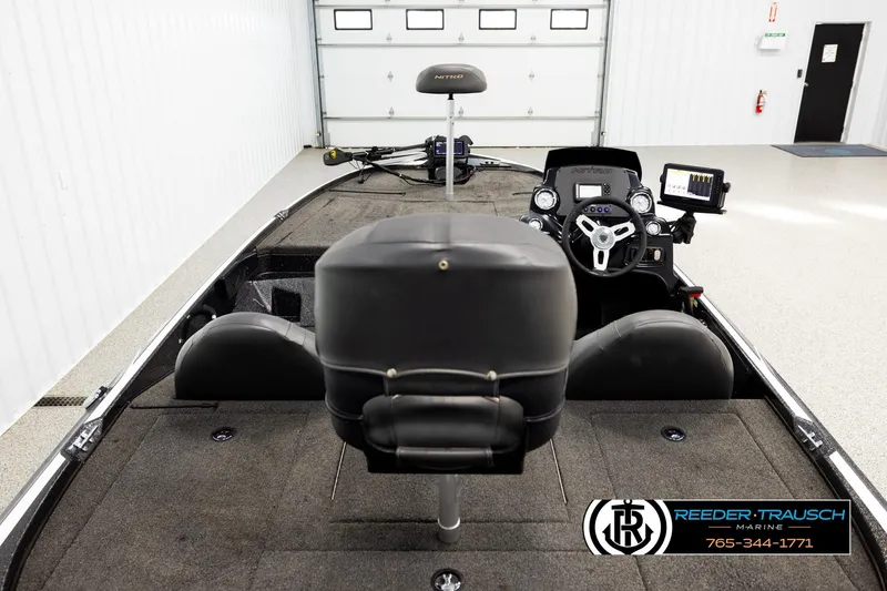 Slide: The Image of Interior of a 2021 Ntiro Z17 boat with steering console and seating. - 12