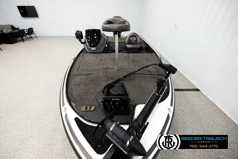 Slide: The Image of 2021 Ntiro Z17 fishing boat in showroom, featuring spacious deck and seating. - 15