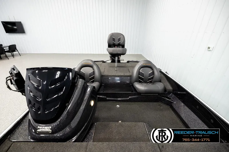 Slide: The Image of 2021 Nitro Z17 boat interior with sleek seating and modern design in showroom. - 16