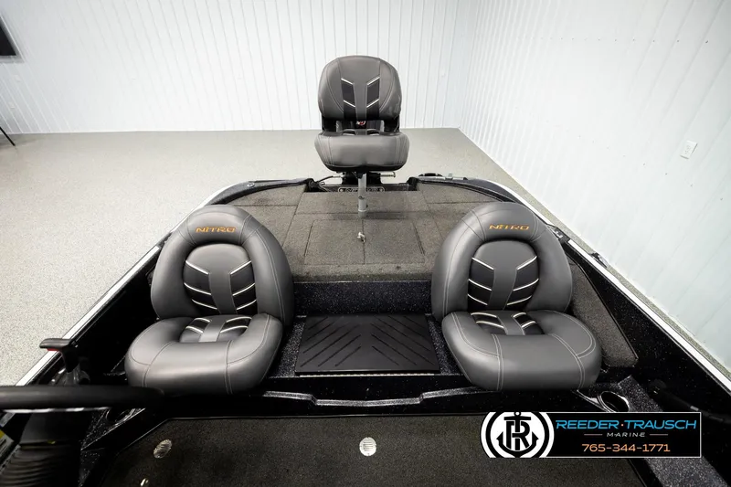 Slide: The Image of Interior of a 2021 Ntiro Z17 boat with three gray seats. - 17