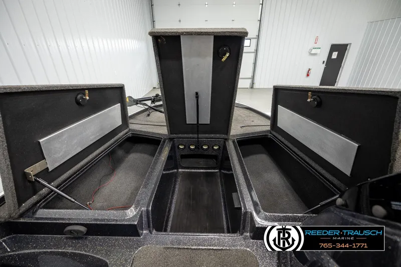 Slide: The Image of 2021 Ntiro Z17 boat storage compartments in a showroom setting. - 19