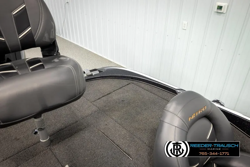 Slide: The Image of Interior of a 2021 Ntiro Z17 boat with cushioned seating. - 26