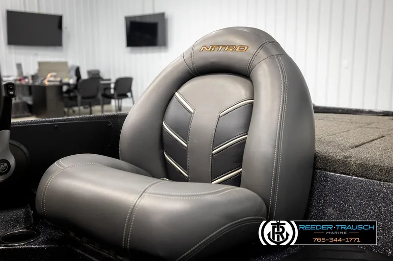 Slide: The Image of Gray Ntiro Z17 boat seat in showroom, Reeder-Trausch Marine logo visible. - 39