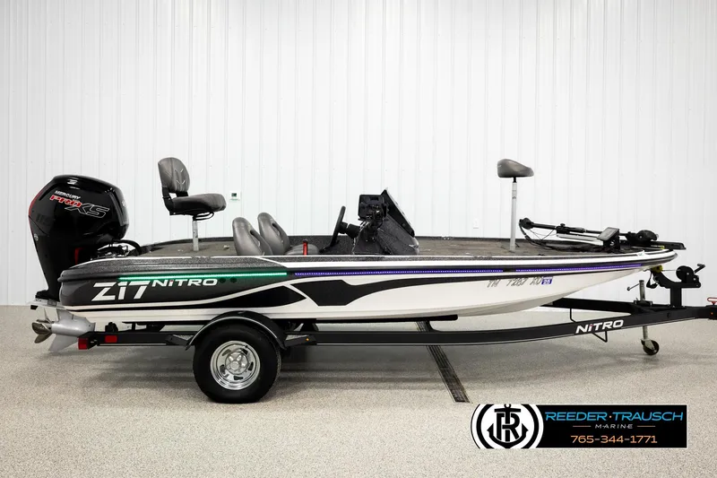 Slide: The Image of 2021 Ntiro Z17 fishing boat with trailer, featuring Mercury Pro XS engine. - 4