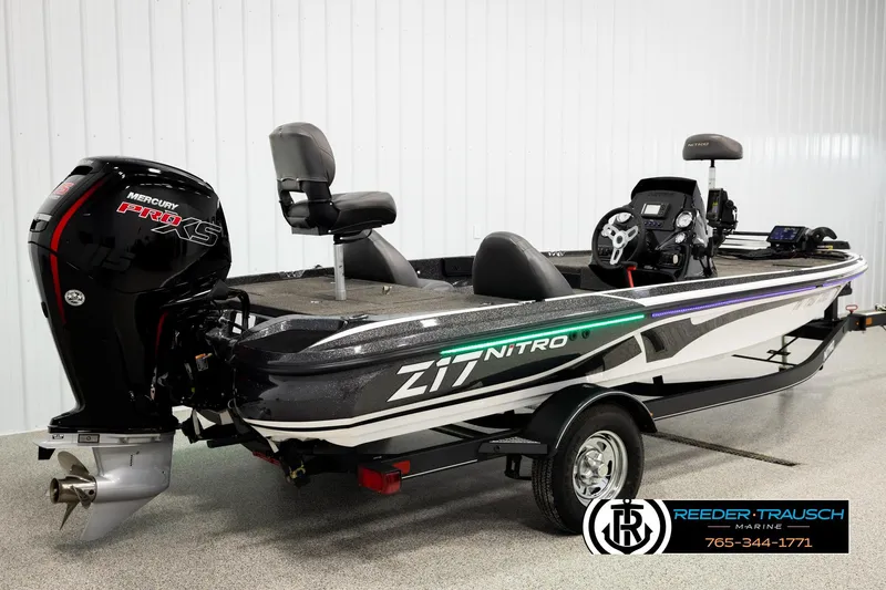 Slide: The Image of 2021 Ntiro Z17 boat with Mercury Pro XS engine in showroom setting. - 5