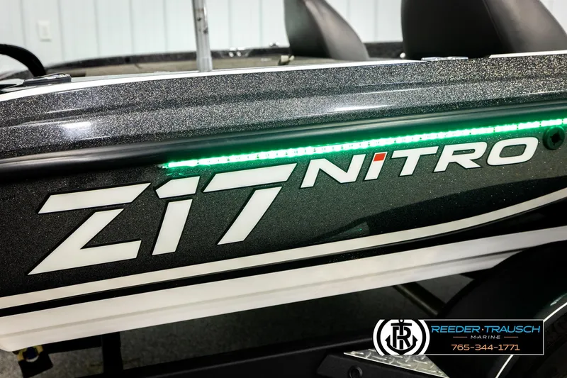 Slide: The Image of 2021 Ntiro Z17 boat with green LED lights and Reeder-Trausch Marine logo. - 52