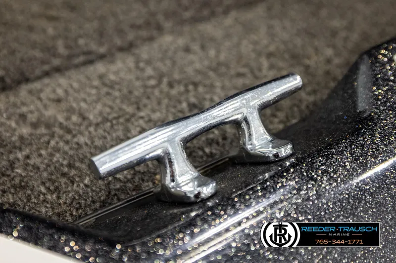 Slide: The Image of Chrome cleat on Ntiro Z17 boat, 2021 model, with Reeder-Trausch Marine branding. - 53