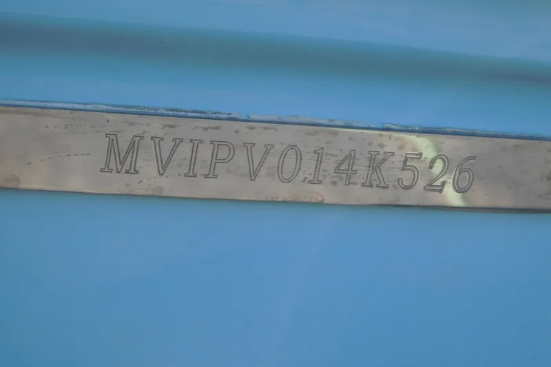 Slide: The Image of VIN plate on a 2026 Pathfinder 2300 HPS boat, displaying "MVIPV014K526". - 26