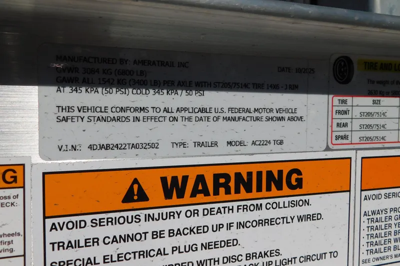 Slide: The Image of Sticker on Pathfinder 2300 HPS 2026 trailer with safety and warning information. - 28