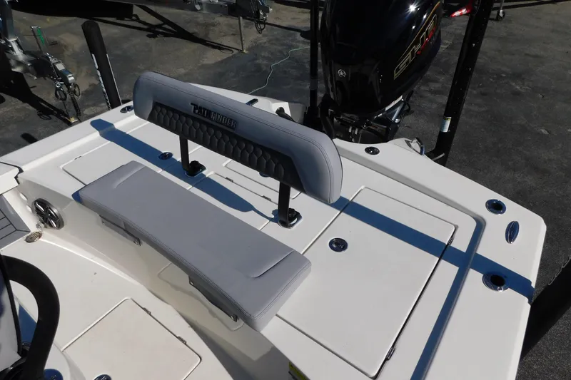 Slide: The Image of 2026 Pathfinder 2300 HPS boat interior with seating and motor detail. - 9