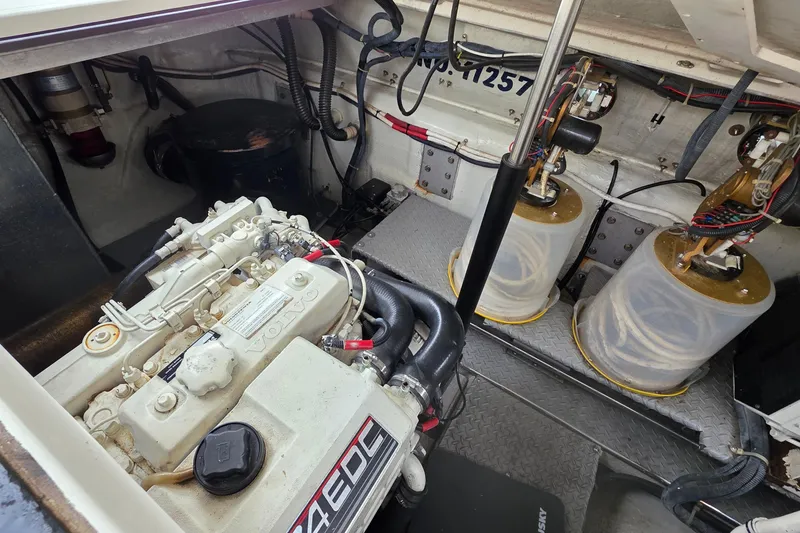 Slide: The Image of Engine room of 2002 Regal Commodore 4260 with Volvo Penta engine and mechanical components. - 57