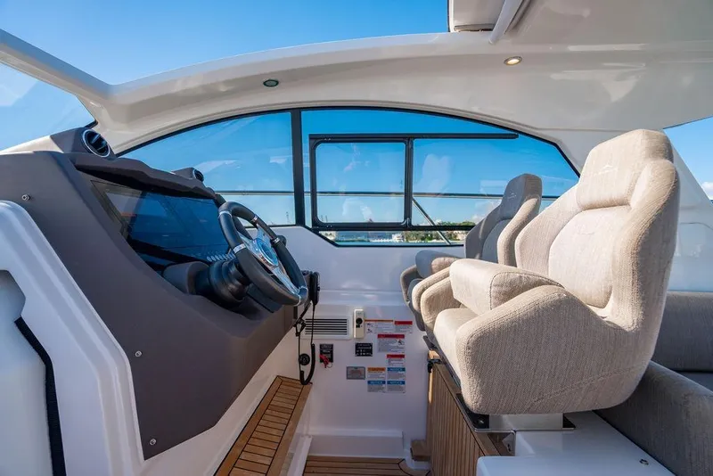 Slide: The Image of Interior of 2022 Azimut Atlantis 45 yacht with modern helm and plush seating. - 16