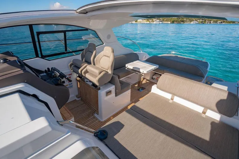 Slide: The Image of Luxurious 2022 Azimut Atlantis 45 yacht interior with plush seating and ocean view. - 20
