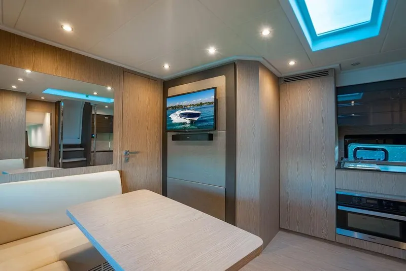 Slide: The Image of Luxurious interior of 2022 Azimut Atlantis 45 yacht with modern furnishings and ambient lighting. - 5