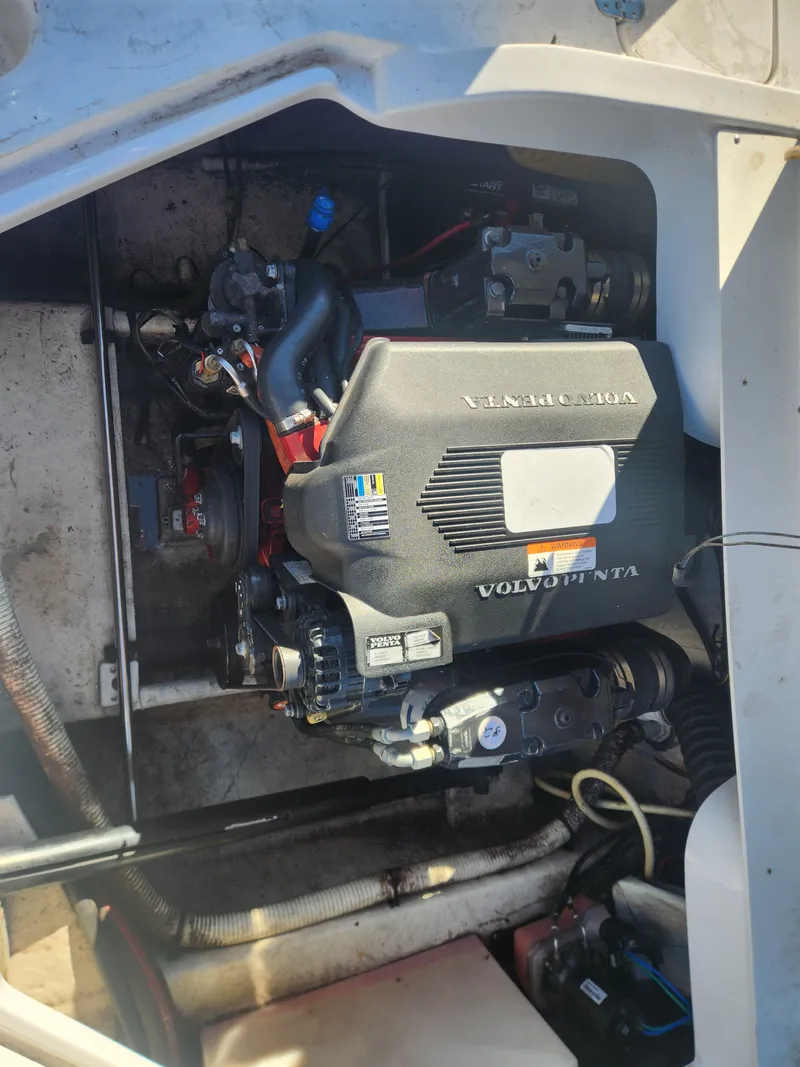 Slide: The Image of Volvo Penta engine in a 2005 Four Winns 214 Funship boat. - 12