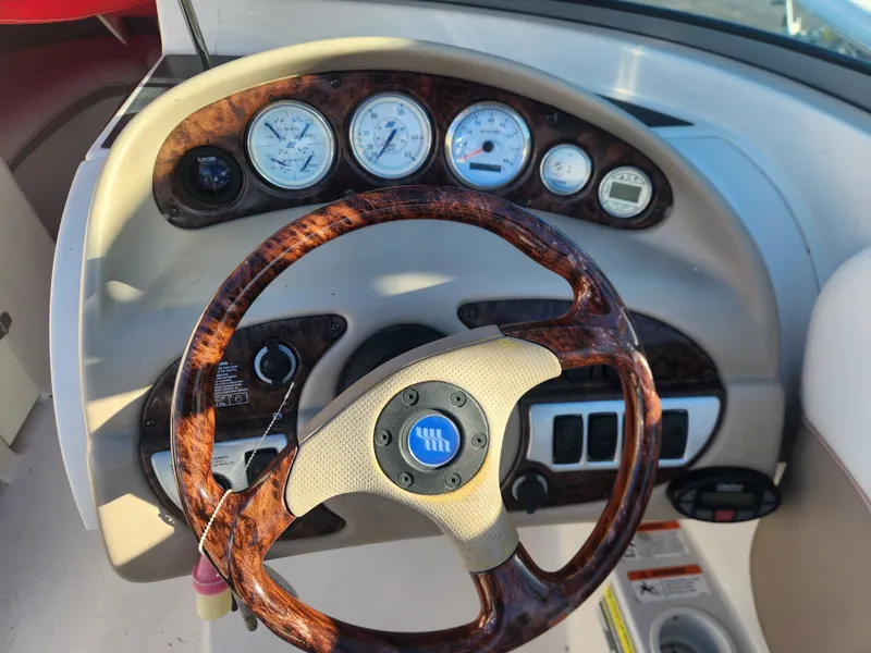 Slide: The Image of Dashboard of a 2005 Four Winns 214 Funship boat. - 7