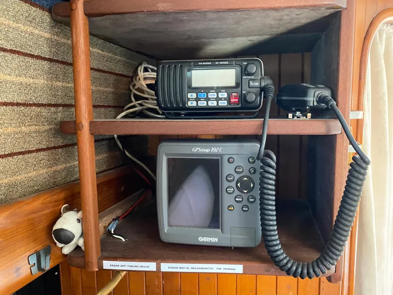 Slide: The Image of Nautical radio and GPS equipment on a 1981 Hans Christian 38 Mark II sailboat. - 37
