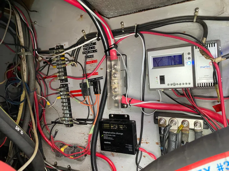 Slide: The Image of Electrical panel with wiring and components in a 1981 Hans Christian 38 Mark II boat. - 39