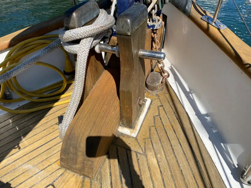 Slide: The Image of Deck of 1981 Hans Christian 38 Mark II sailboat with ropes and wooden fittings. - 41