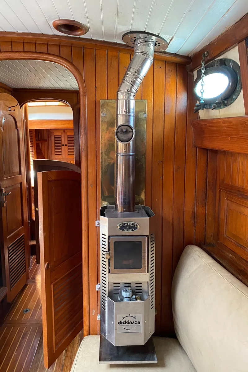Slide: The Image of Wood-paneled interior of 1981 Hans Christian 38 Mark II with a compact stove. - 6
