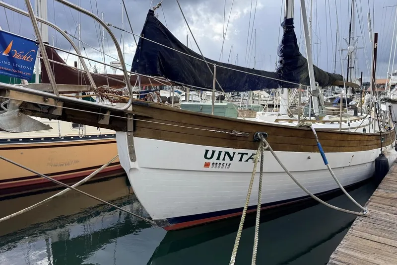 Slide: The Image of 1981 Hans Christian 38 Mark II sailboat docked in marina, overcast sky. - 72
