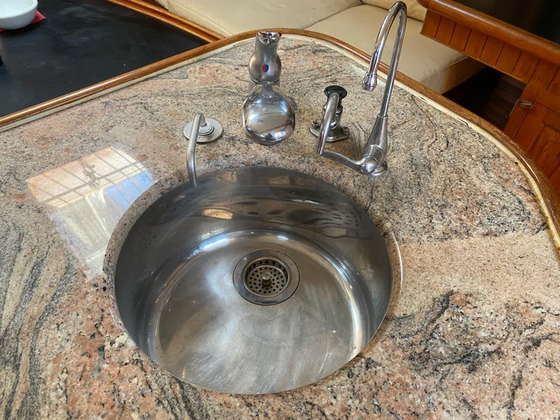 Slide: The Image of Stainless steel sink on granite countertop in 1981 Hans Christian 38 Mark II yacht. - 9