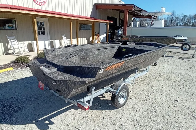 Slide: The Image of 2026 Alweld 1756 Invader boat on trailer outside a building. - 11