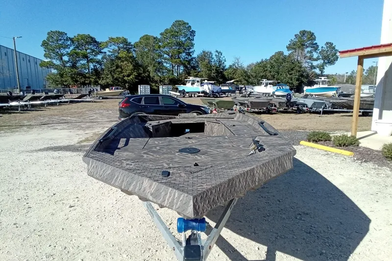 Slide: The Image of 2026 Alweld 1756 Invader boat on trailer in outdoor lot. - 5