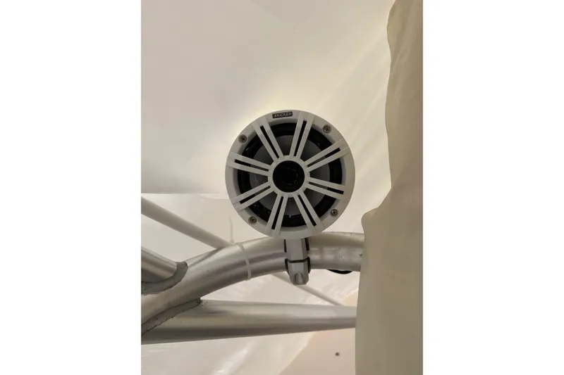 Slide: The Image of Speaker mounted on a 2005 Grady-White Express 330 boat's metal frame. - 26