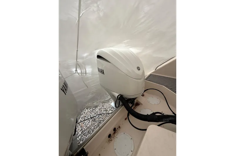Slide: The Image of 2005 Grady-White Express 330 boat with Yamaha outboard engine under cover. - 39