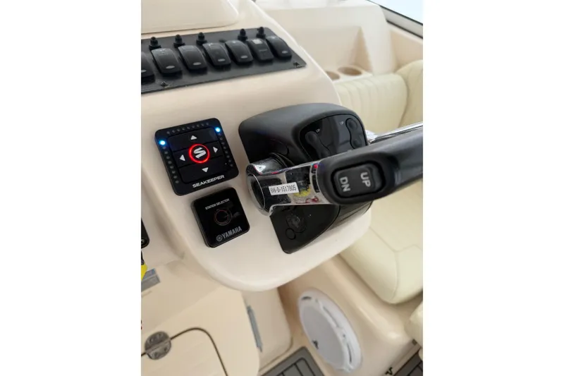 Slide: The Image of Control panel of a 2005 Grady-White Express 330 boat with Seakeeper and Yamaha systems. - 7