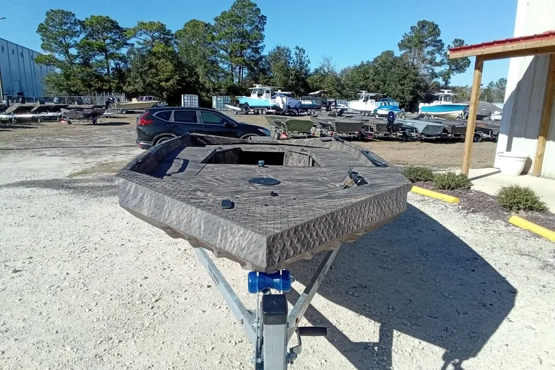 Slide: The Image of 2026 Alweld 1652 Invader boat on trailer in outdoor lot. - 5